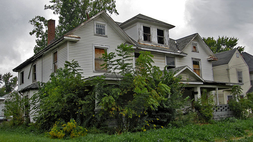 3. It doesn't take nature long to have its way with a house once it has been abandoned as the condition of this house on Blaine Avenue proves.